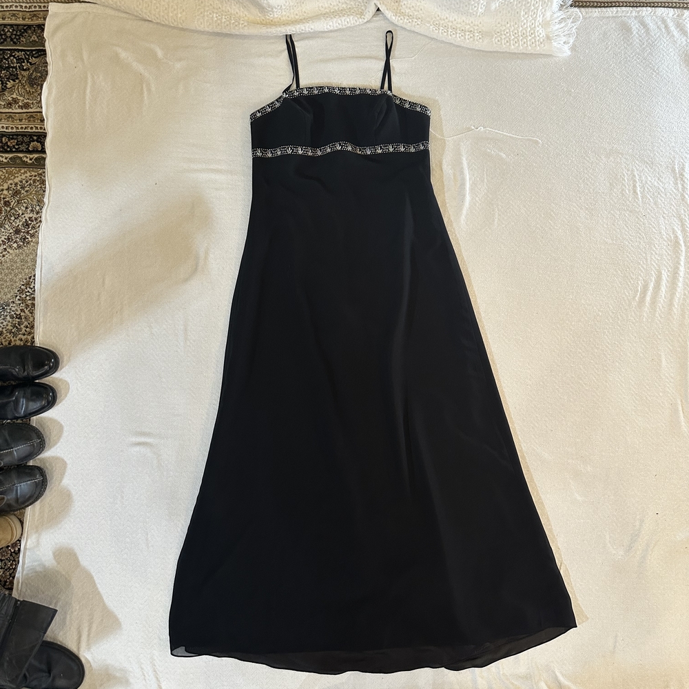 Elegant Black Dress with Embellished Details